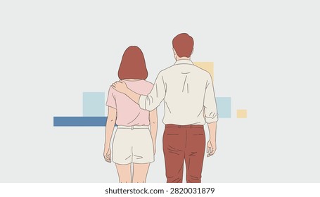 Rear view of affectionate young couple standing together with man putting his arm around woman shoulder on minimalist background.