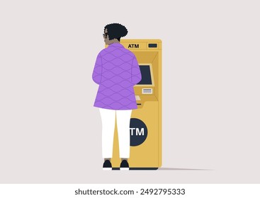 A rear view of a curly lady withdrawing money from an outdoor ATM machine