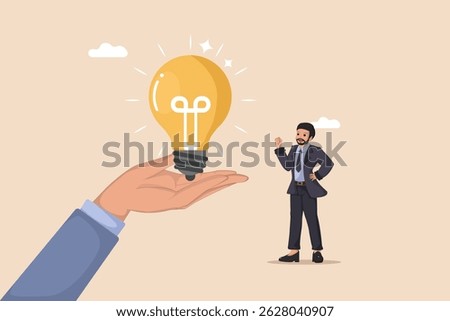 Receiving a Brilliant Idea. A Businessman Looking Towards a Glowing Light Bulb Being Offered on an Open Palm.