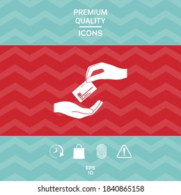 Receiving credit card. Hand holding credit card.