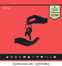Receiving the key with keychain shaped like a house - icon.