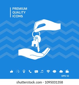 Receiving the key with keychain shaped like a house - icon.