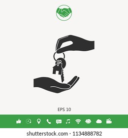 Receiving the key with keychain shaped like a house - icon.