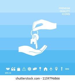 Receiving the key with keychain shaped like a house - icon.