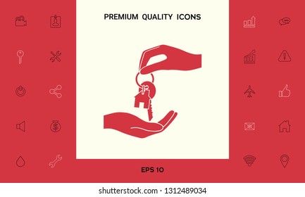 Receiving the key with keychain shaped like a house - icon. Graphic elements for your design