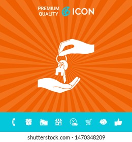 Receiving the key with keychain shaped like a house - icon. Graphic elements for your design