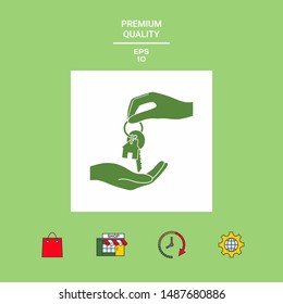 Receiving the key with keychain shaped like a house - icon. Graphic elements for your design
