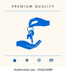 Receiving the key with keychain shaped like a house - icon. Graphic elements for your design