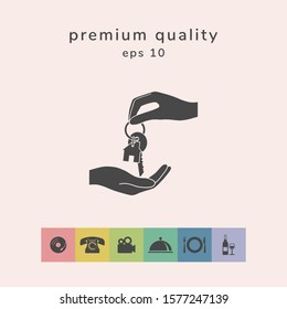 Receiving the key with keychain shaped like a house - icon. Graphic elements for your design