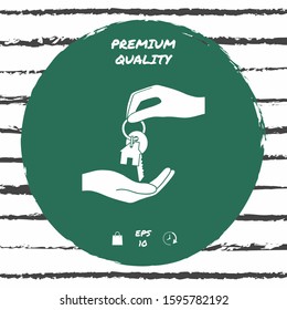 Receiving the key with keychain shaped like a house - icon. Graphic elements for your design