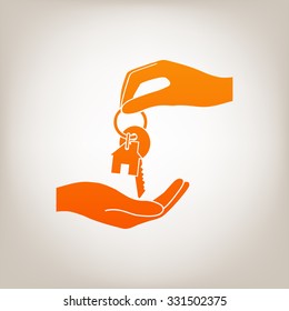 Receiving the key with keychain shaped like a house - icon.