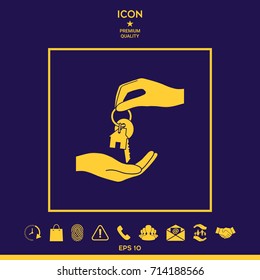Receiving the key with keychain shaped like a house - icon.