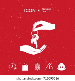 Receiving the key with keychain shaped like a house - icon.