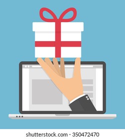 Receiving or ordering gift online concept. Hand holding white gift box with red bow out of a laptop screen. Flat style