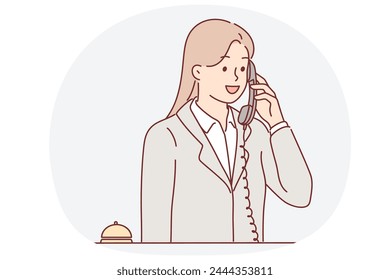 Receptionist woman talking on phone answering customer call with request to send maid or waiter. Receptionist girl works in hotel helping guests feel comfortable and makes career in field of HoReCa