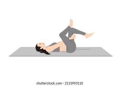 Reclined Pigeon Pose. Beautiful girl practice Supta Kapotasana. Young attractive woman practicing yoga exercise. working out, black wearing sportswear, grey pants and top, indoor full length, calmness