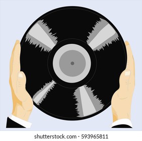 Record in hand in color.