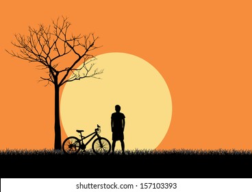 Recreation outside the city by the river at sunset