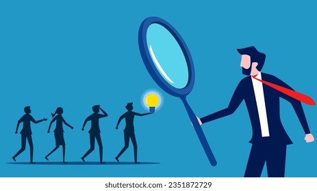 Recruiting knowledgeable personnel. Businessman using a magnifying glass to select smart job candidates