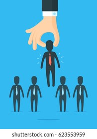 Recruitment concept. Large hand picking right choice from the businessmen silhouettes group. Vector illustration in simple flat style.