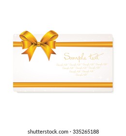 Rectangle paper card with gold ribbon and tied bow.