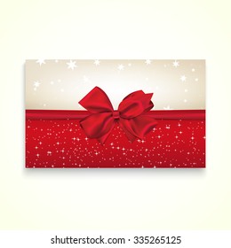 Rectangle paper card with red ribbon and tied bow.