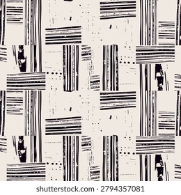 Rectangular beige blocks with black textured stripes and scattered dots