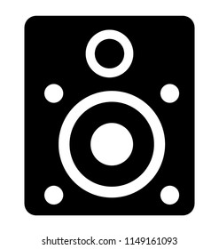 
A rectangular box with circles on it depicting speaker
