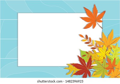 Rectangular sheet of paper, autumn leaves on a blue background.