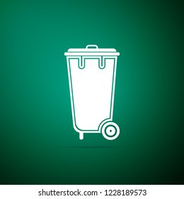 Recycle bin with icon isolated on green background. Trash can icon. Flat design. Vector Illustration