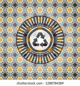 recycle icon inside arabesque style emblem. arabic decoration.