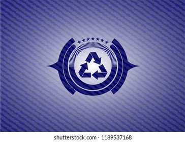 recycle icon inside badge with denim texture