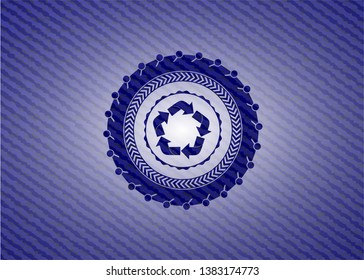recycle icon inside badge with denim texture