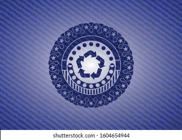 recycle icon inside badge with denim texture