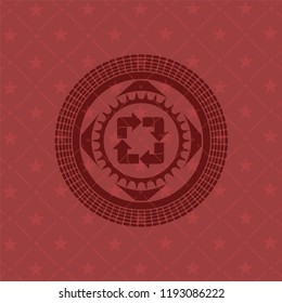 recycle icon inside badge with red background