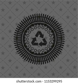 recycle icon inside black emblem