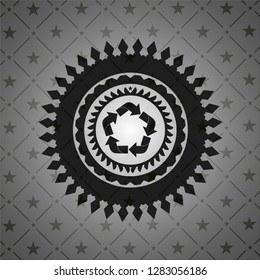 recycle icon inside black emblem