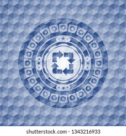 recycle icon inside blue badge with geometric pattern.
