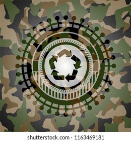 recycle icon inside camouflage texture
