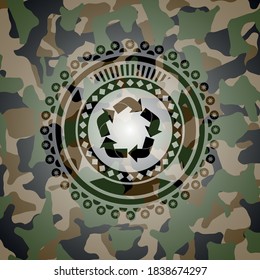 recycle icon inside camouflage texture. 