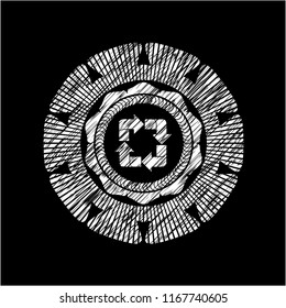 recycle icon inside chalk emblem written on a blackboard