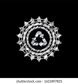 recycle icon inside chalkboard emblem on black board