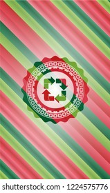 recycle icon inside christmas badge background.