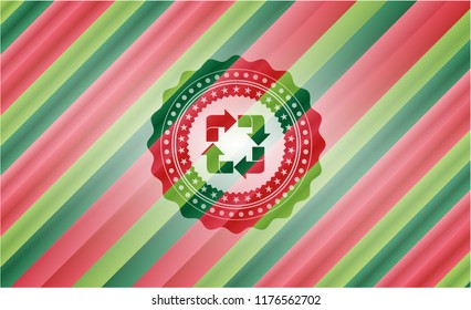 recycle icon inside christmas colors style badge.