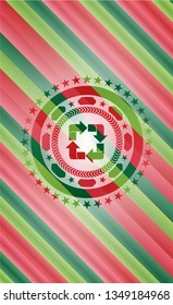 recycle icon inside christmas style emblem.