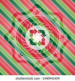 recycle icon inside christmas style emblem.