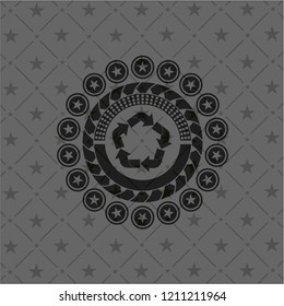 recycle icon inside dark badge or emblem