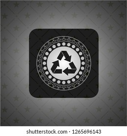 recycle icon inside dark badge or emblem