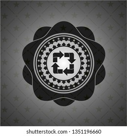recycle icon inside dark badge or emblem