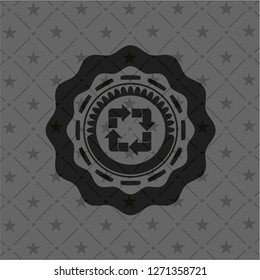 recycle icon inside dark emblem
